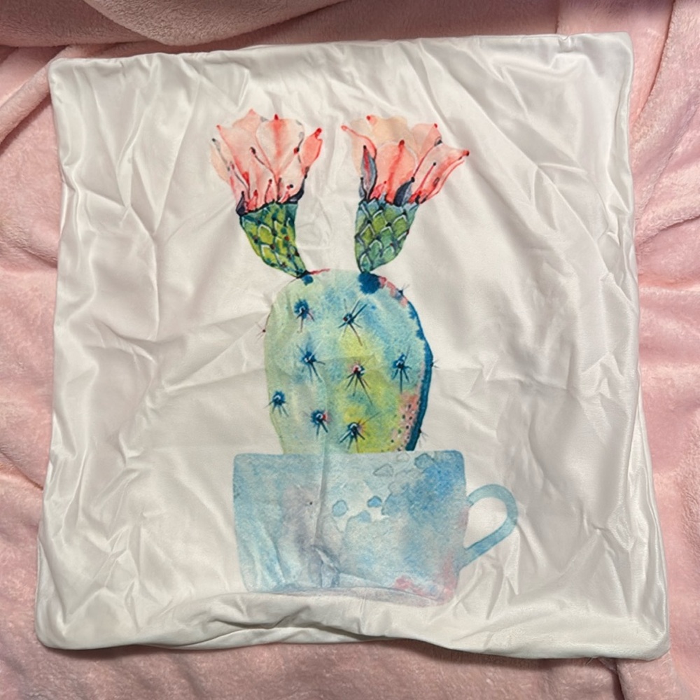 Pair of 17”x17” pillow covers decorated with a‎ cactus and succulent design.